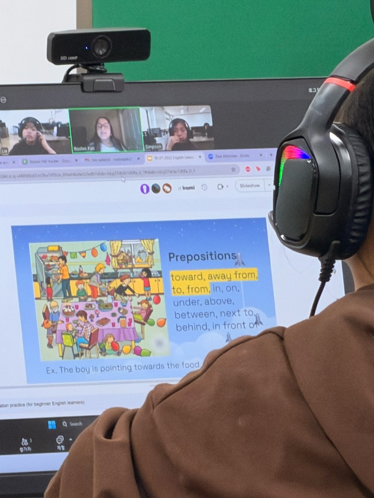 Roshni Pati teaching prepositions over Zoom